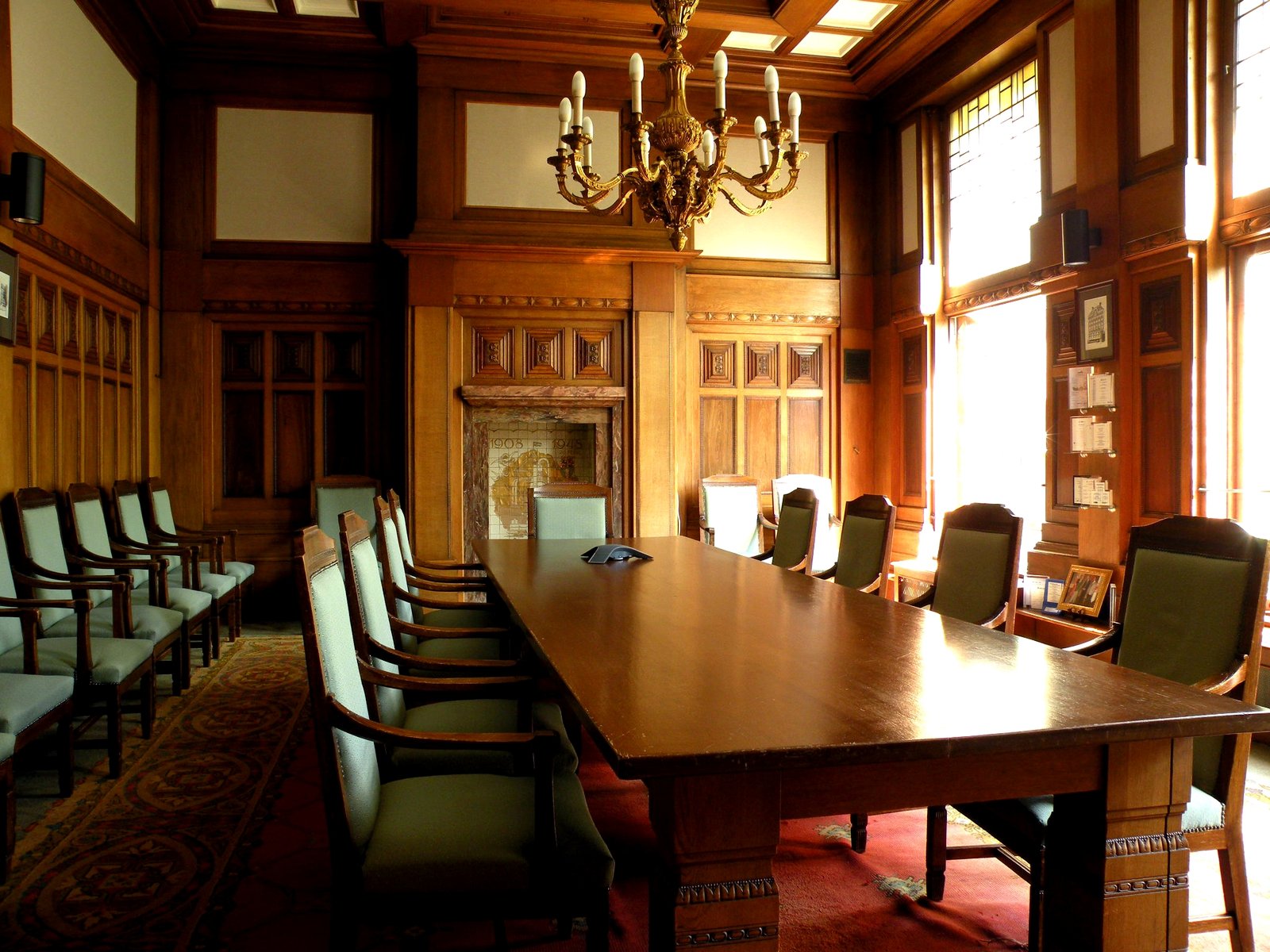 Institutional boardroom setting, representing the executive environment where formal mentoring and leadership decisions take place
